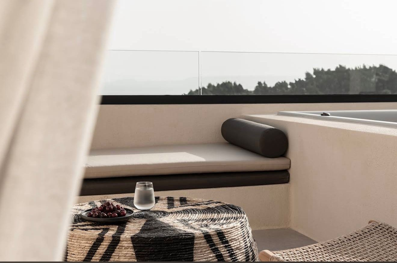 Outdoor pool and lounge area of a unit